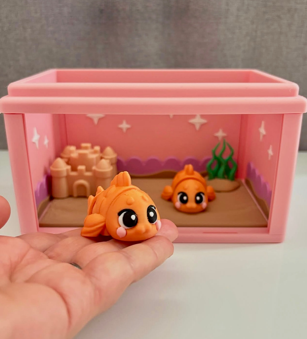 Mini goldfish and tank